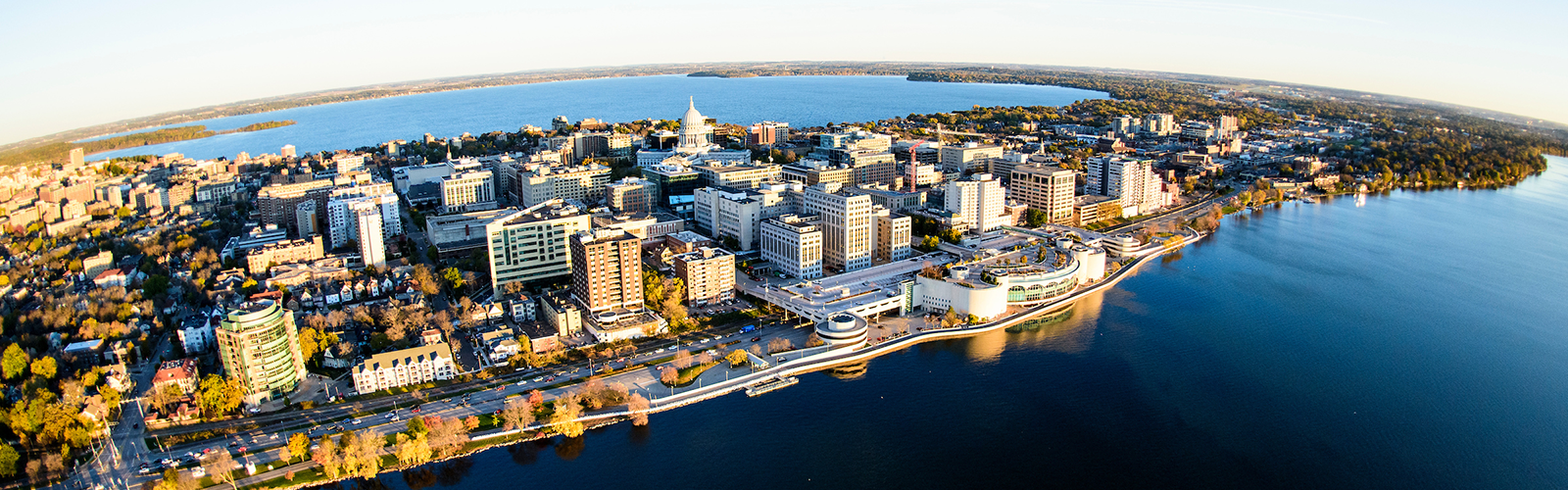 An aerial view of Lake Monona, Lake Mendota, and downtown Madison.