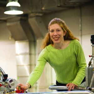 Katie Henzler-Wildman uses the equipment in the National Magnetic Resonance Facility at Madison.