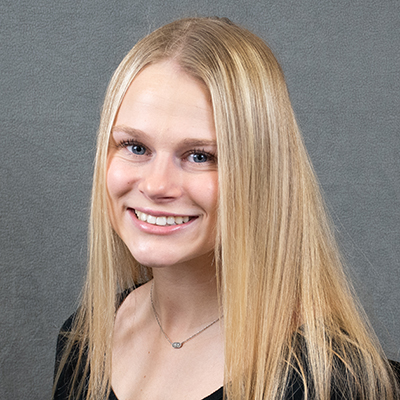 Headshot photo of Riley Martiny. 