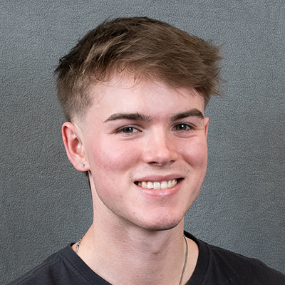 Headshot of Andrew Moysis.