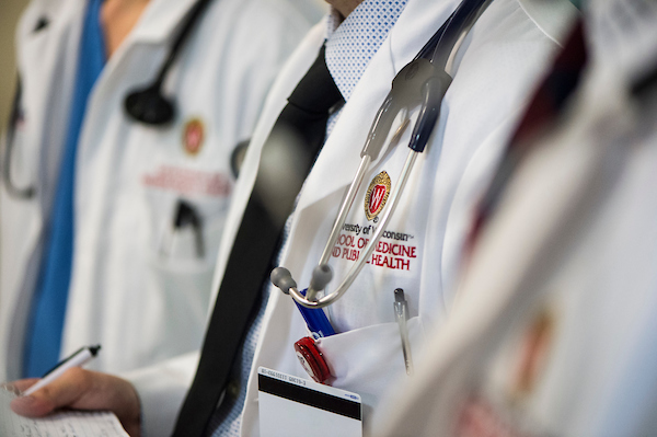 Close-up of a doctor's lab coat and stethoscope.