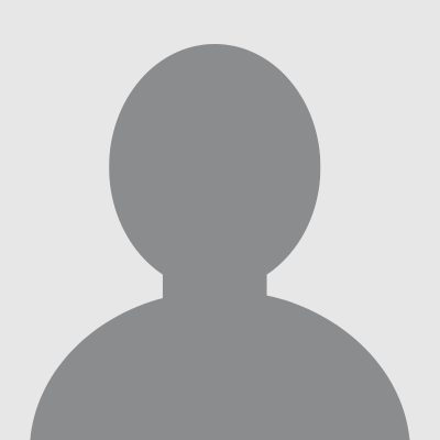 Generic gray outline of a head and shoulders as a headshot placeholder.