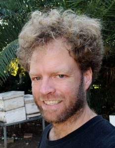 Headshot photo of Danny Minahan.