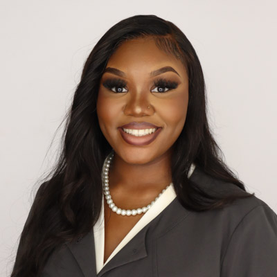 Headshot of Ja'Nyla Holcomb.