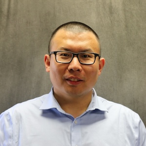 Headshot of Fei Zhou.