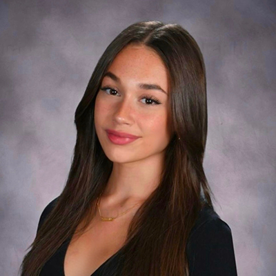 Headshot of Caroline Baquero.