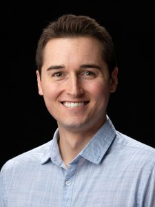 Headshot photo of Ben Hall.