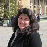 Headshot photo of Corinna Burger.