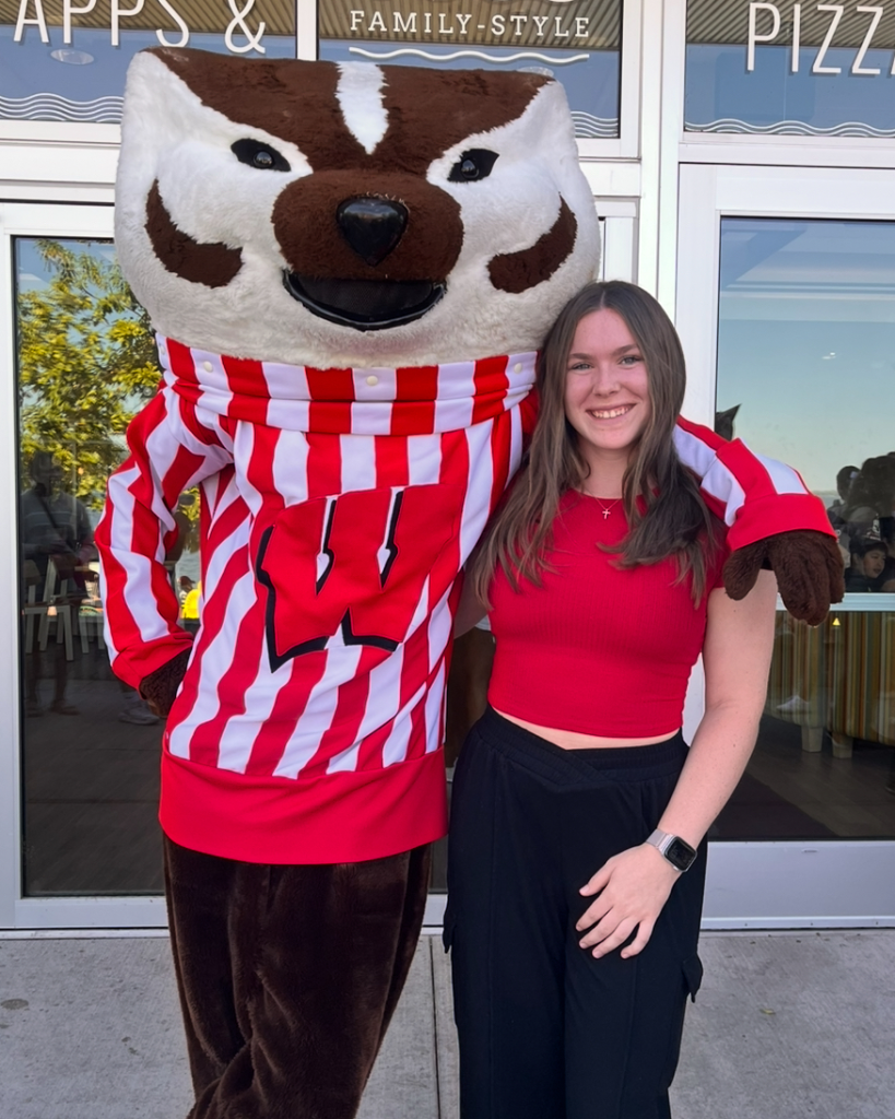 Marcie Wait standing with Bucky.