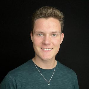 Headshot photo of William Huhn.