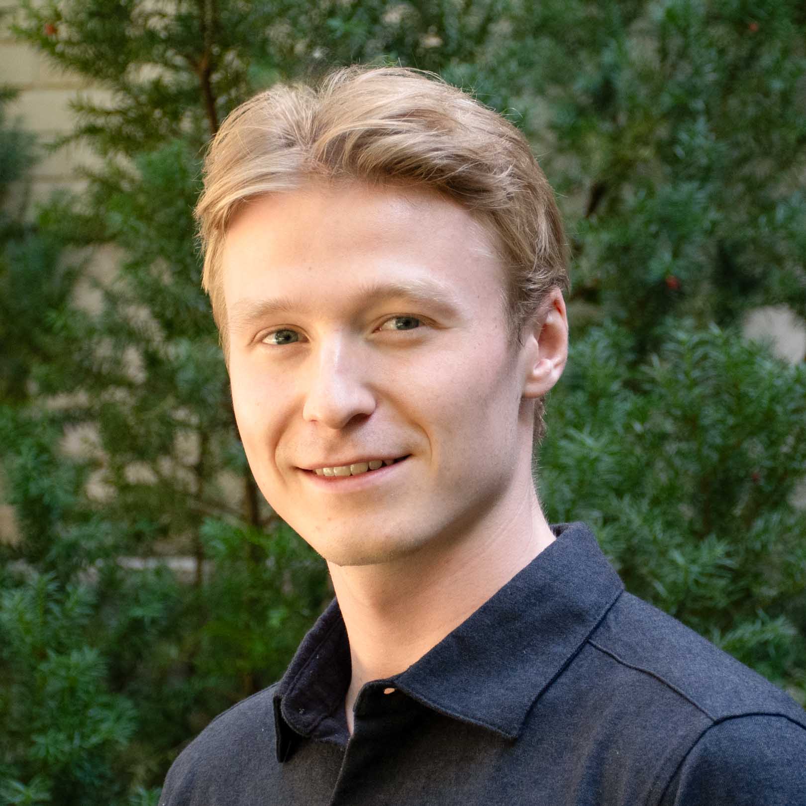 Headshot photo of Brock Peyton.