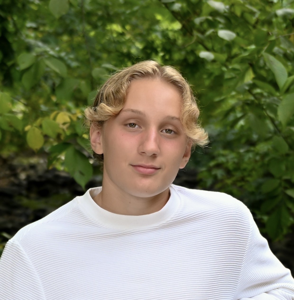 Headshot photo of Tanner Thoms.
